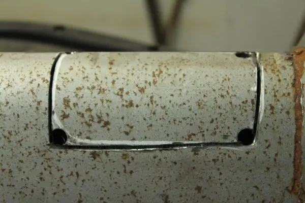 
				STEP 6 remove metal to access hole
				