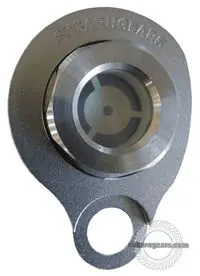 Metallic mechanical component with circular design.